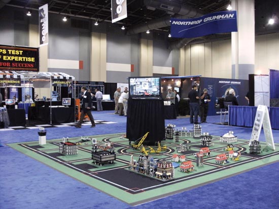 Miniature autonomous vehicles navigating the mean streets of a LEGO town take center stage on the show floor to highlight the Institute of Navigation’s first Mini-Urban Challenge and upcoming second challenge, now seeking sponsors.