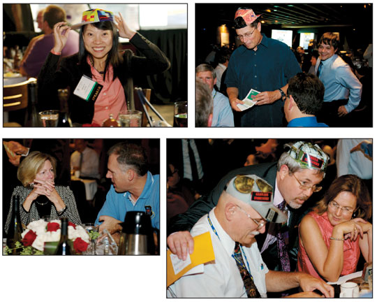 • (Clockwise from top left) China User Grace Gao (Stanford) puts on her business face. Captain Frank van Diggelen (Broadcom) recalls, “Grace, assisted by Sherman Lo, leapt into the fray, and was soon taking care of all the business 10 times more effectively than the rest of us together. We were left to tally the numbers, count money, and drink the wine — activities we found hard to keep up with, the speed with which Grace made things happen.” • Compass Operator Mike Whitehead (Hemisphere GPS) flashes a wad of several hundred million dollars at Russian industrialists John Lavrakas (Advanced Research) and Art Gower (Lockheed Martin), as U.S. Industry captain Matt Harris (Boeing) kibbitzes. • China Industry rep Frank Czopek (Boeing) negotiates with Russian industrialists Vince Massimi (MITRE) and Antje Tucci (University FAF Munich). • GPS Wing Commander Bernie Gruber finds a quiet moment to get the real story from (Mrs.) Ginny Parkinson.