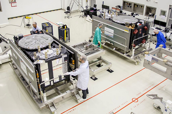 Dorese and Milena rest side by side in clean room S1A.