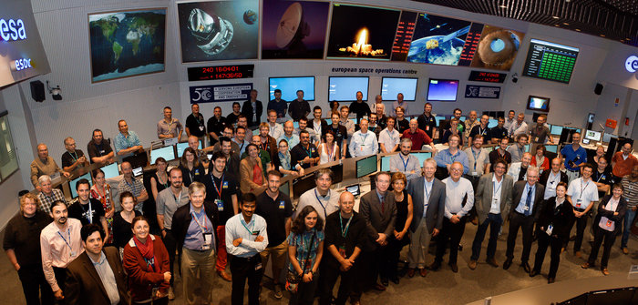 The Galileo operations team, joined by Director General Jean-Jacques Dordain, Director of Human Spaceflight and Operations Thomas Reiter and experts from European industry, in the Main Control Room at ESA’s Space Operations Centre, ESOC, in Darmstadt, Germany, August 28, 2014. (Photo courtesy of ESA)