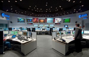 ESOC serves as the Operations Control Centre for ESA missions and hosts ESA's Main Control Room (shown here), combined Dedicated Control Rooms for specific missions and the ESTRACK Control Centre, which manages ESA's worldwide ground tracking stations. (Credit: ESA)