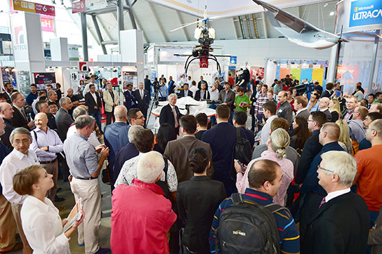 CEO Johannes Riegl unveils the new RIEGL BathyCopter at the Riegl INTERGEO booth in Stuttgart.