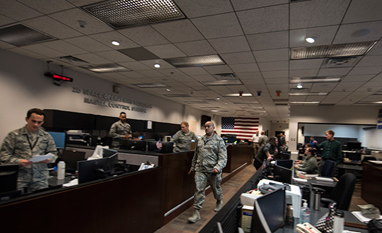 The 2nd Space Operations Squadron operations floor is a flurry of activity during 2nd SOPS’s formal command of Architecture Evolution Plan 7.5. (Photo: USAF/Senior Airman William Tracy)