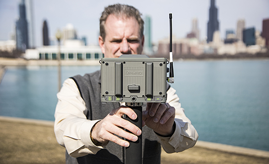Tim Burch uses a JAVAD GNSS receiver. (Photo: Ed Koziarksi)