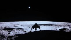 An image captured by Blue Ghost shows its shadow on the moon’s surface, with Earth on the horizon. (Photo: Firefly Aerospace)
