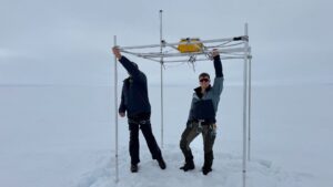 Greenland is shifting centimeters northwest each year, shows new research led by Danjal Longfors Berg (right). The island’s size also changes due to bedrock stretching and compression. (Photo: DTU Space)