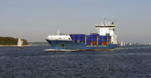 A container ship on the way to the Kiel Canal in Germany. (Credit: 7000/iStock/Getty Images Plus)