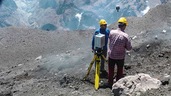 Dust, noxious gas and loose rock near the summit makes volcanic surveying especially challenging. (Photo: Trimble)